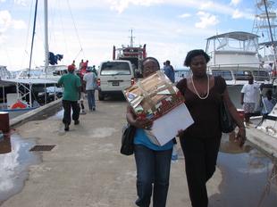 Image #33 - Hurricane Tomas Relief Effort (Carrying the goods to the distribution point)